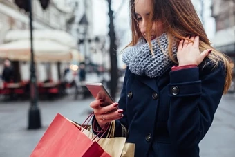 Girl uses smartphone