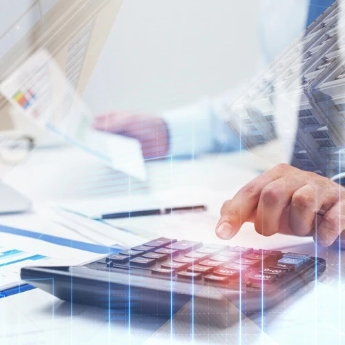 man's hand using calculator business background